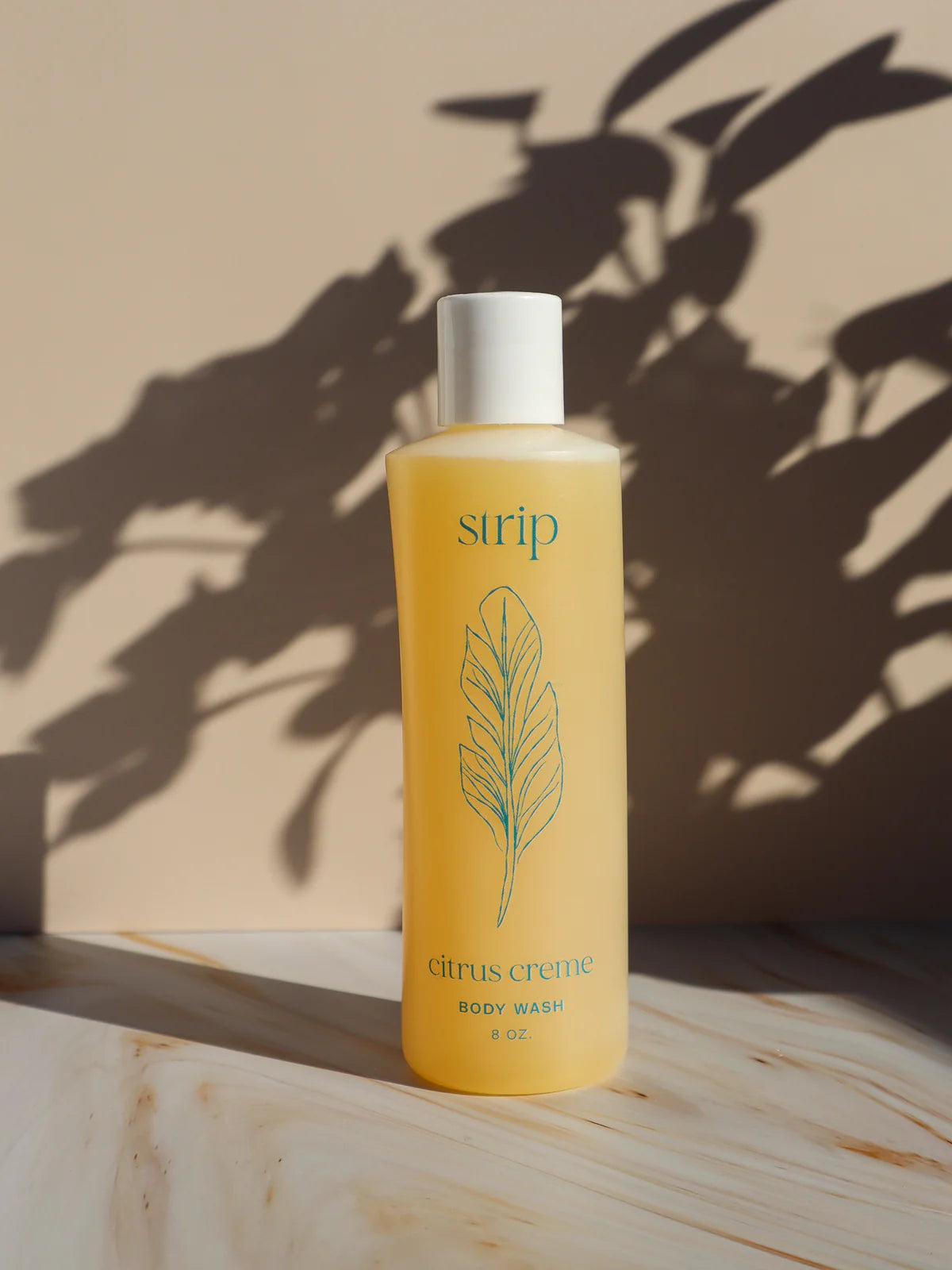 Citrus Crème castile body wash made with olive oil, coconut oil, and lemon scent – vegan, all-natural cleanser for soft, refreshed skin.