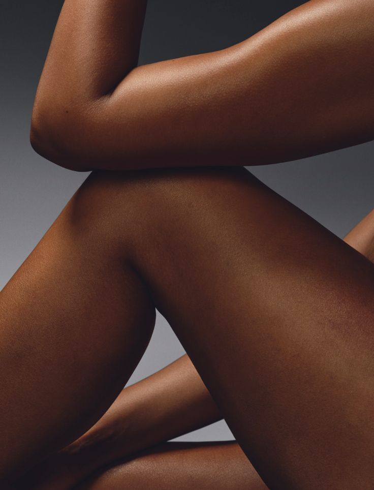 Smiling client after leg wax at Beauty Bar by Mare in Spring, Texas