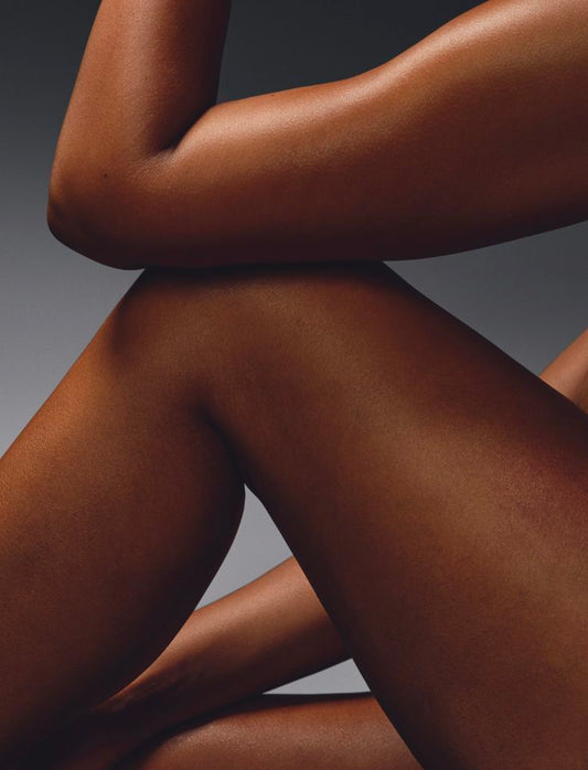 Smiling client after leg wax at Beauty Bar by Mare in Spring, Texas