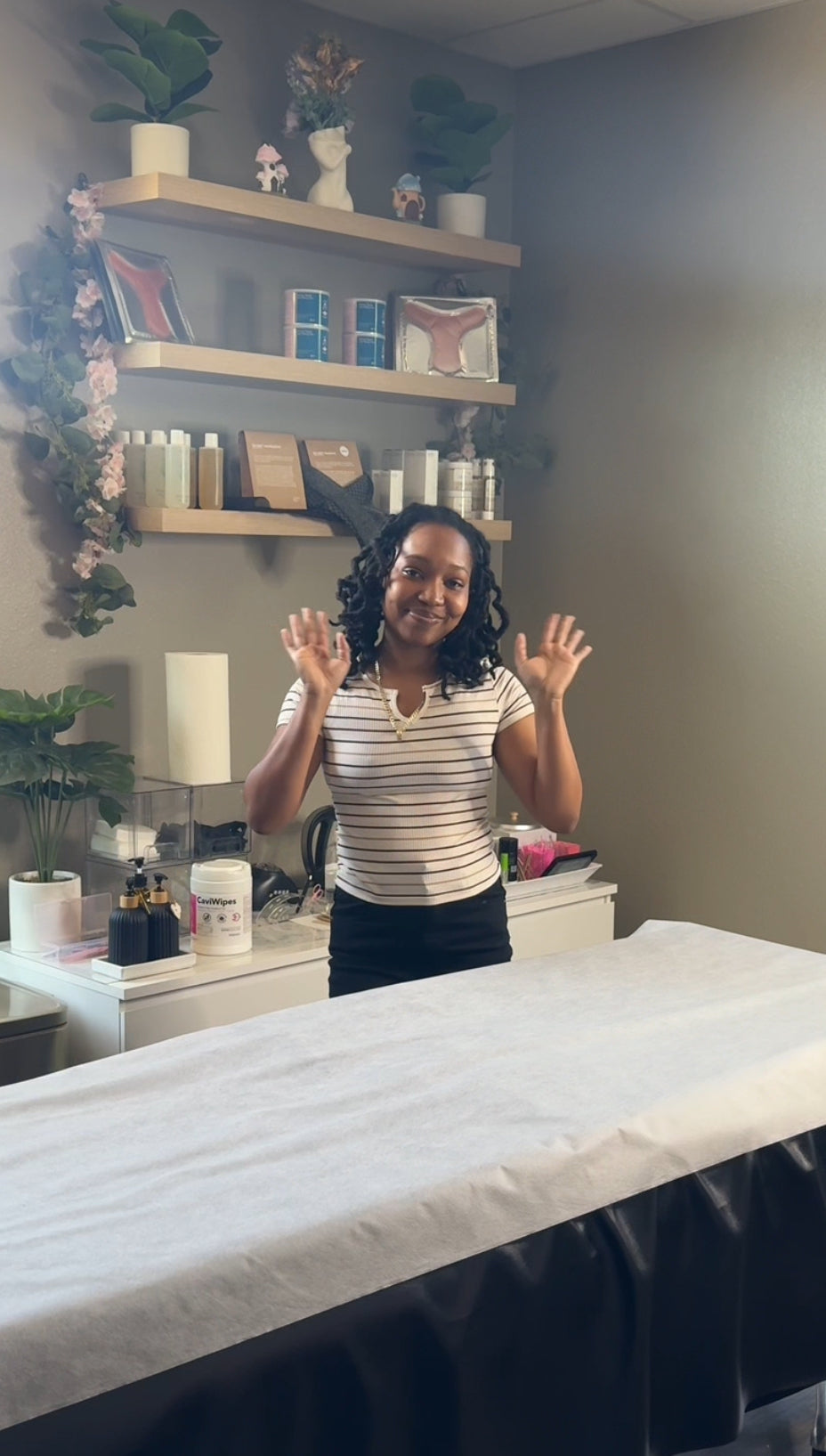Client receiving waxing service at Beauty Bar by Mare Spring TX waxing studio preparing for summer smooth skin season in North Houston