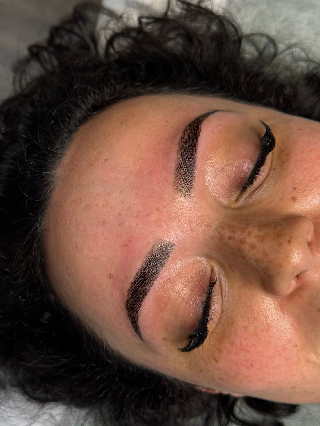 A summer-ready client at Beauty Bar by Mare in Spring, TX enjoys freshly waxed, smooth skin — perfect for Houston's pool season, beach trips, and warm weather confidence all summer long.