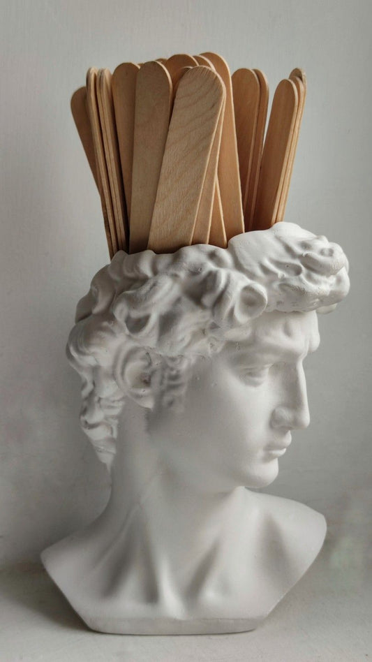 Relaxed client enjoying a Brazilian wax at Beauty Bar by Mare, Spring TX