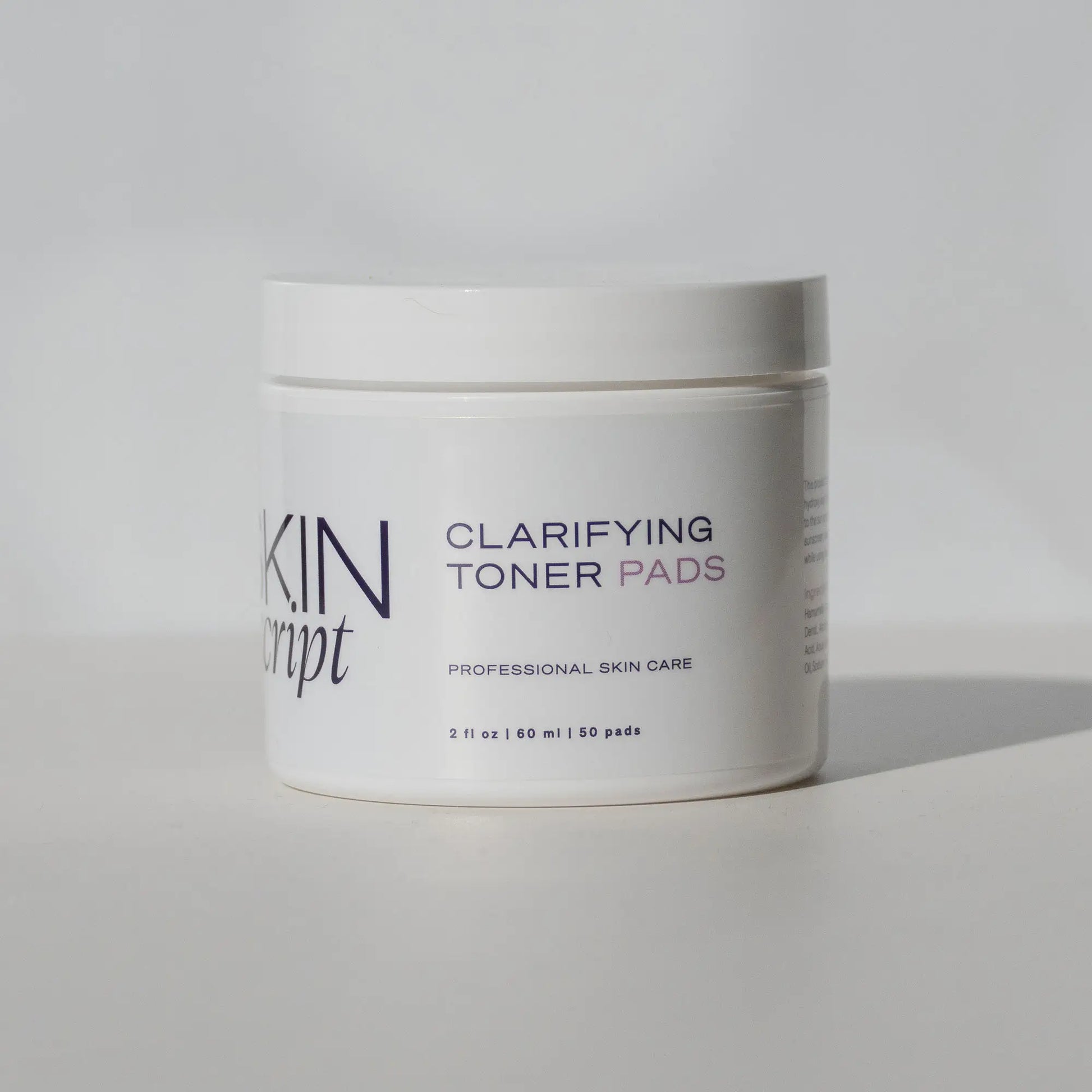 Clarifying toner pads for oily and acne-prone skin designed to exfoliate, refine pores, and improve skin texture
